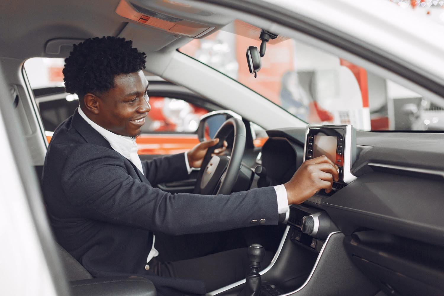 handsome-elegant-man-car-salon